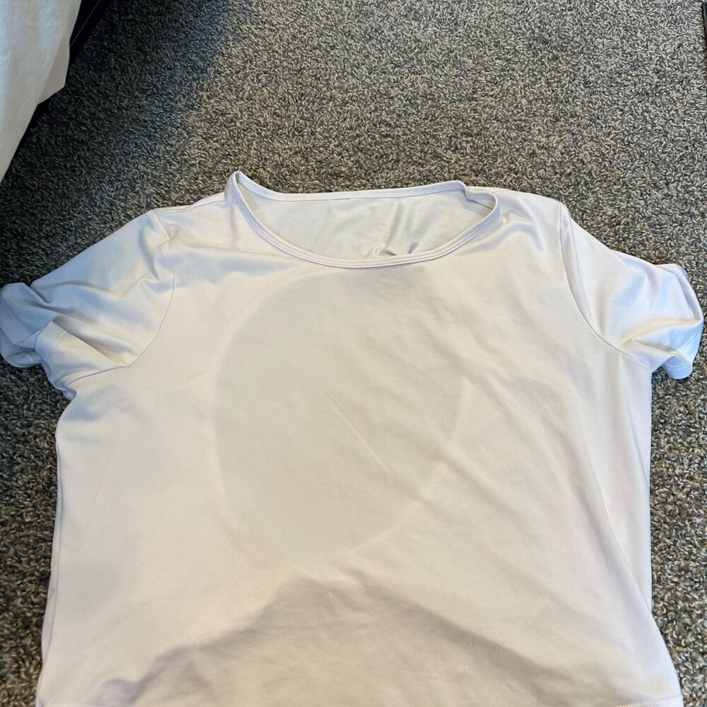 white workout crop top with back cutout
